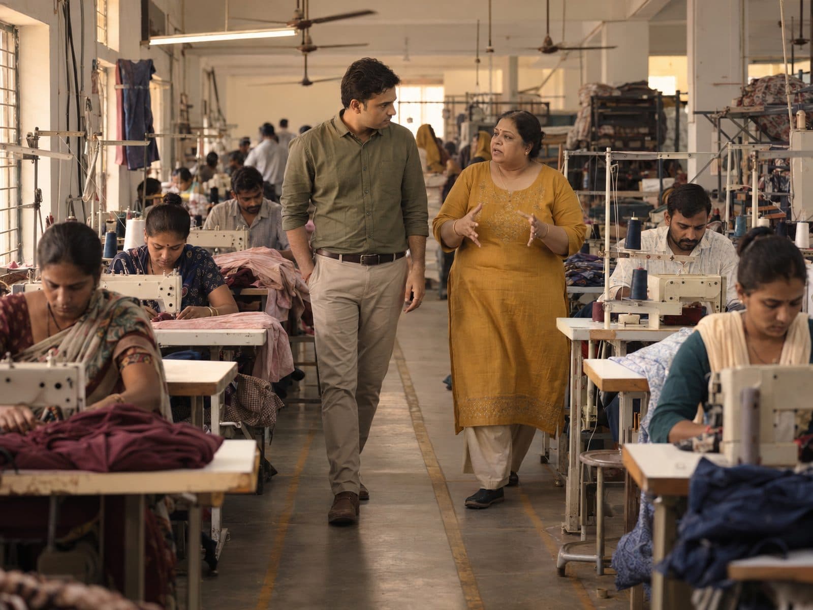 The owner walking a consultant through the workshop.